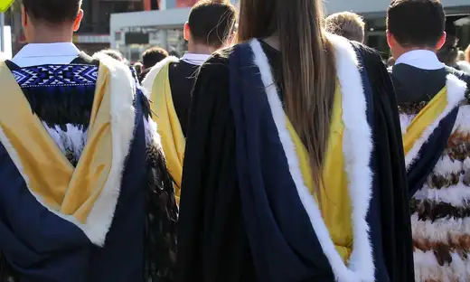 Small group wearing academic dress