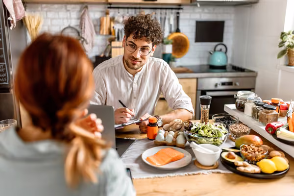 Two people discuss human nutrition