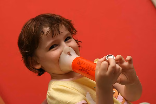 Child using an inhaler