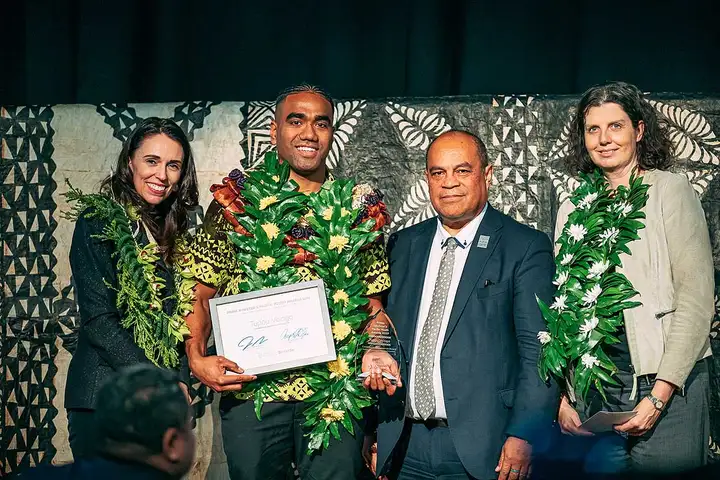 Tupou Veiogo collecting the Commercial and Corporate Award