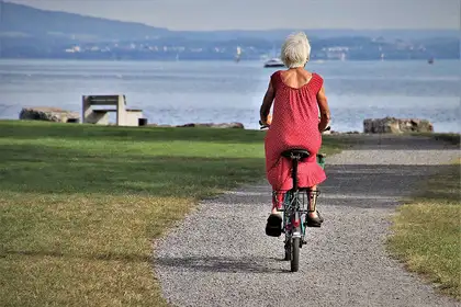 Woman riding bike in park
