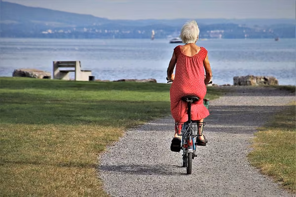 Woman riding bike in park
