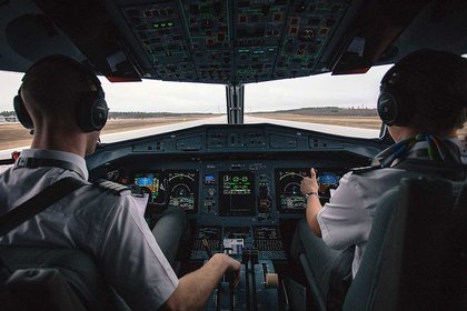 Pilots in a plane cockpit