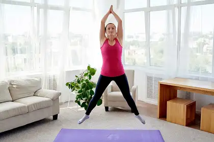 Woman exercising at home.