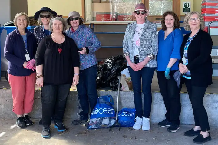 Library staff posing for a group photo during a Green Impact litter pick-up on the Manawatū campus.