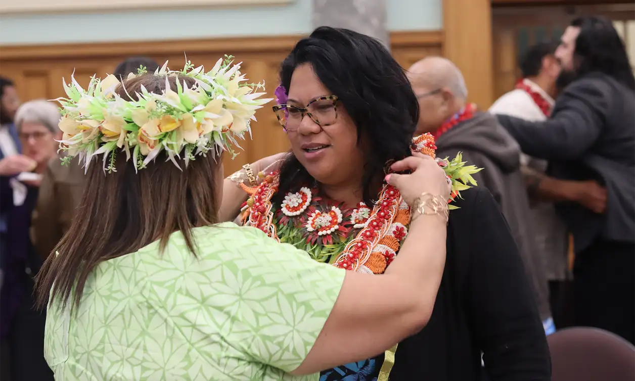 Dr Hana Tuisano embraces Associate Professor Siautu Alefaio-Tugia at the Parliament-held book launch for Siautu in June 2023.