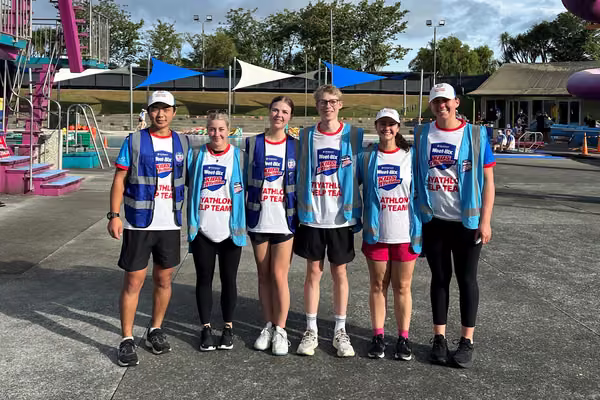 group of student athletes standing outside in matching Weet-Bix TRYathlon shirts