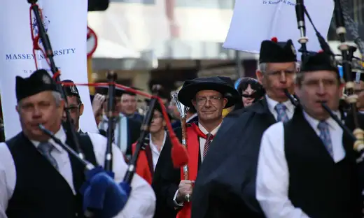 Bagpipe players in graduation procession
